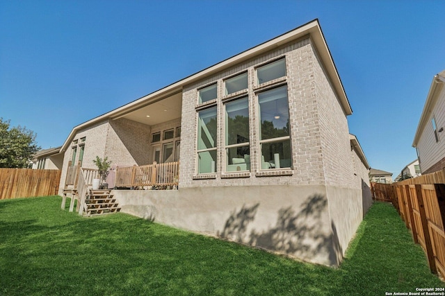 9032 Raven Pointe, San Antonio, TX 78255 - rear view of property featuring stairway, a fenced backyard, a wooden deck, and brick siding