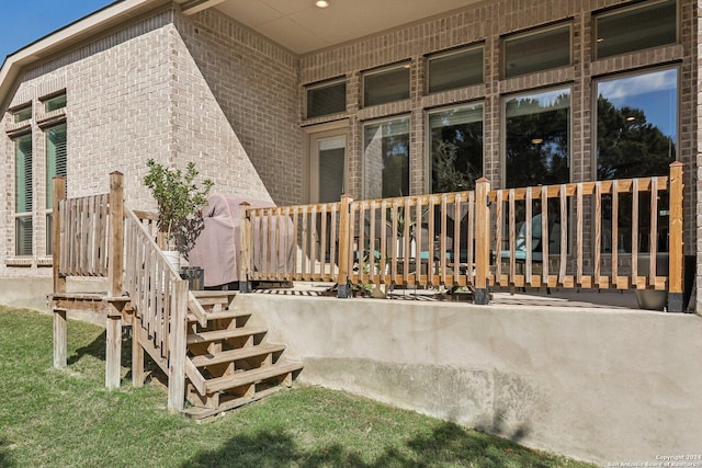9032 Raven Pointe, San Antonio, TX 78255 - view of property exterior featuring stairway, brick siding, and a wooden deck