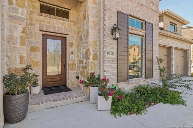 9032 Raven Pointe, San Antonio, TX 78255 - property entrance featuring stone siding and brick siding