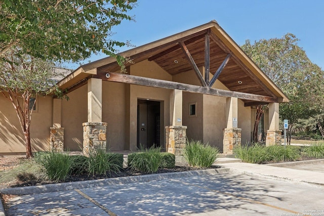 9032 Raven Pointe, San Antonio, TX 78255 - view of front of house with stone siding and stucco siding