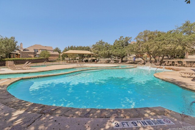 9032 Raven Pointe, San Antonio, TX 78255 - community pool featuring a patio area