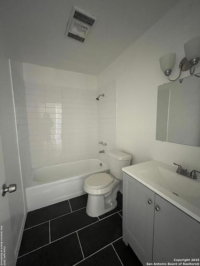 130 N Trevino, Pearsall, TX 78061 - full bath with vanity, tile patterned floors, and bathtub / shower combination