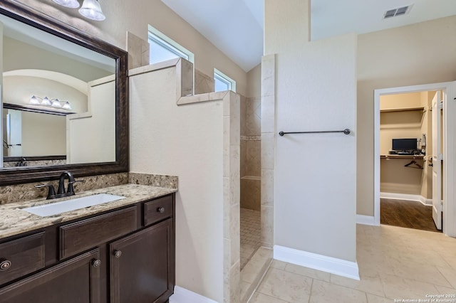 3342 Harvest, Marion, TX 78124 - full bathroom featuring walk in shower, vanity, and a spacious closet