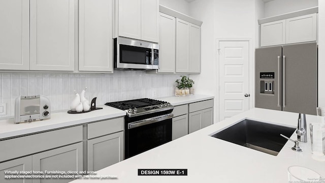 225 Alpine Lks, New Braunfels, TX 78130 - kitchen featuring stainless steel appliances, decorative backsplash, and light countertops