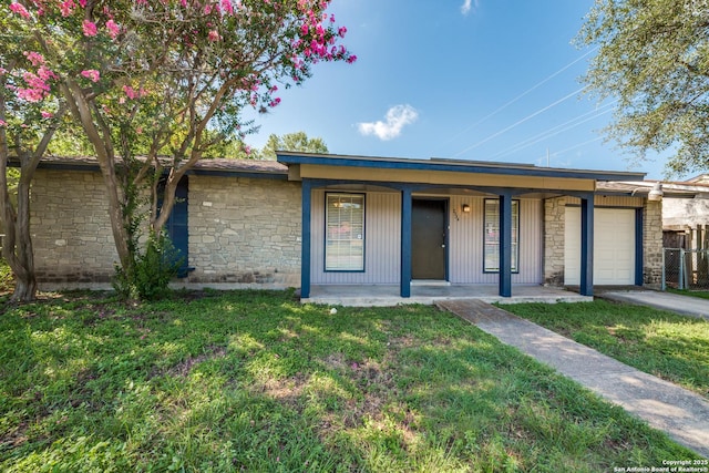 7334 Cherry Brk, San Antonio, TX 78238 - view of front facade featuring a porch, stone siding, and a garage