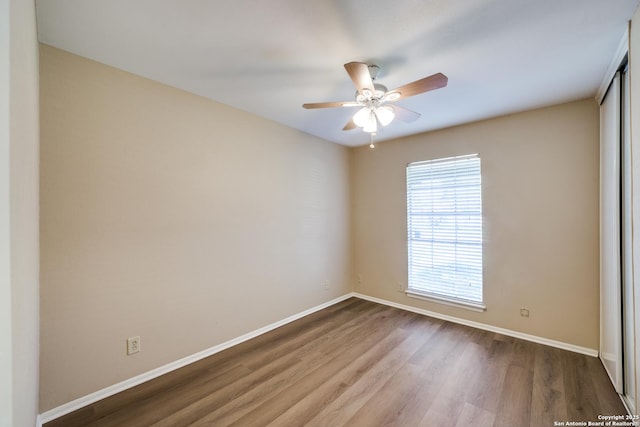 7334 Cherry Brk, San Antonio, TX 78238 - empty room with wood finished floors and ceiling fan