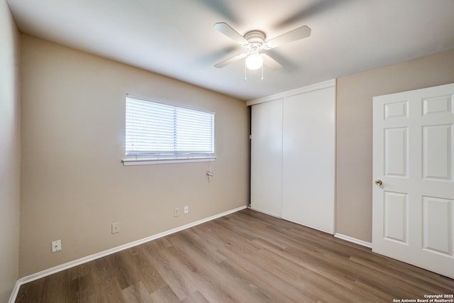 7334 Cherry Brk, San Antonio, TX 78238 - unfurnished bedroom with light wood-type flooring, a closet, and ceiling fan