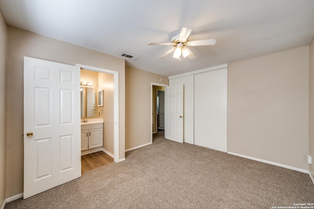 7334 Cherry Brk, San Antonio, TX 78238 - unfurnished bedroom featuring light carpet, a closet, ensuite bath, and a ceiling fan