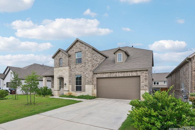 12108 Buckaroo Rnch, San Antonio, TX 78254 - view of front of house featuring brick siding, driveway, a front lawn, an attached garage, and a shingled roof