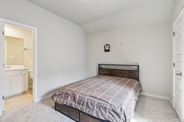 12108 Buckaroo Rnch, San Antonio, TX 78254 - bedroom with light carpet, vaulted ceiling, and ensuite bathroom