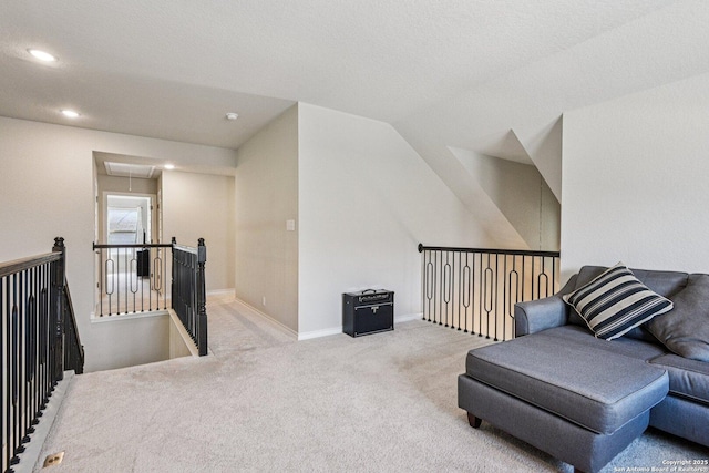12108 Buckaroo Rnch, San Antonio, TX 78254 - sitting room with attic access, carpet, an upstairs landing, recessed lighting, and lofted ceiling
