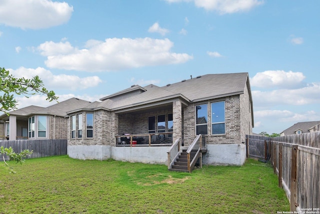 12108 Buckaroo Rnch, San Antonio, TX 78254 - rear view of house with brick siding and a fenced backyard