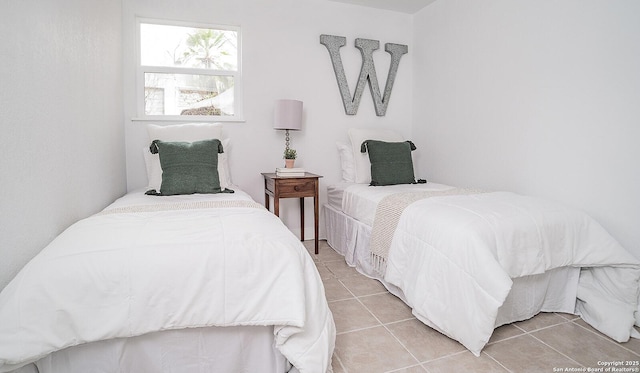 140 Riverview Rd, Mcqueeney, TX 78123 - bedroom featuring light tile patterned floors
