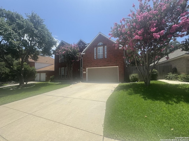 21539 Bubbling Crk, San Antonio, TX 78259 - traditional-style home featuring an attached garage, driveway, and brick siding