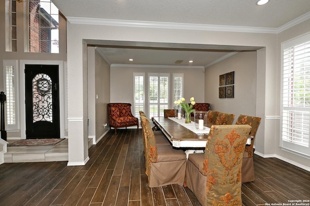21539 Bubbling Crk, San Antonio, TX 78259 - dining area featuring dark wood-type flooring, healthy amount of natural light, crown molding, and recessed lighting