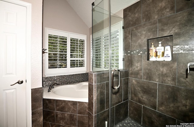 21539 Bubbling Crk, San Antonio, TX 78259 - full bath with vaulted ceiling, a bath, and a shower stall