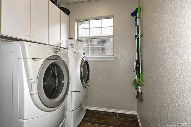 21539 Bubbling Crk, San Antonio, TX 78259 - washroom featuring washer and dryer, cabinet space, dark wood-style floors, and a textured wall