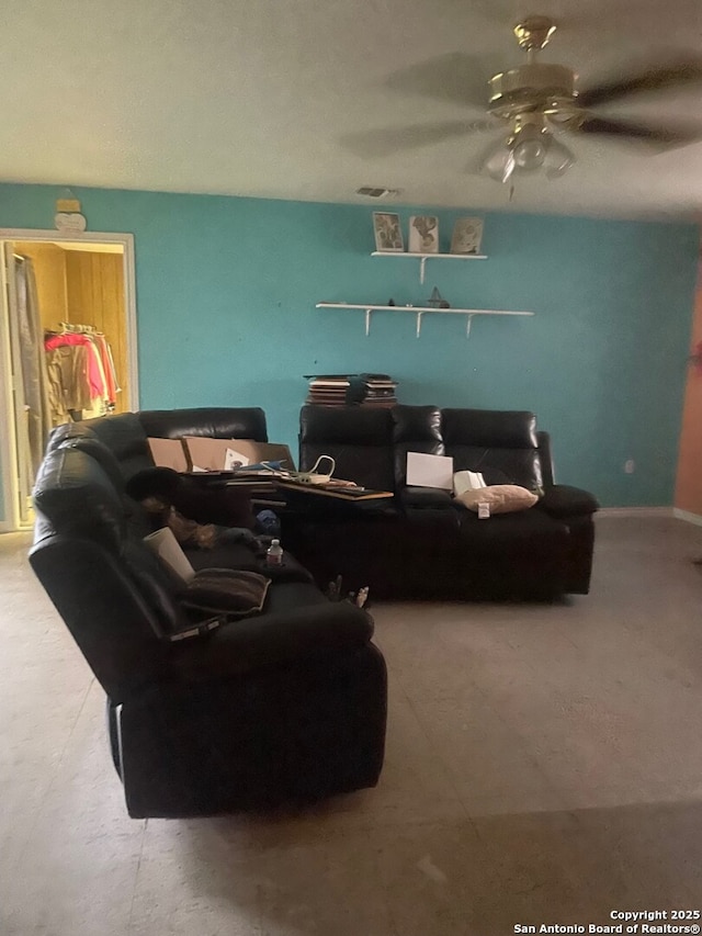 2510 W Mulberry Ave, San Antonio, TX 78228 - carpeted living area with a ceiling fan