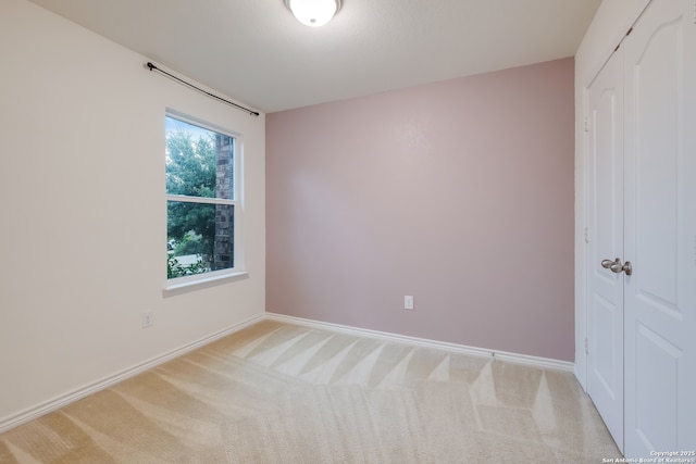 8438 Cordova Pt, San Antonio, TX 78252 - spare room featuring light colored carpet and baseboards