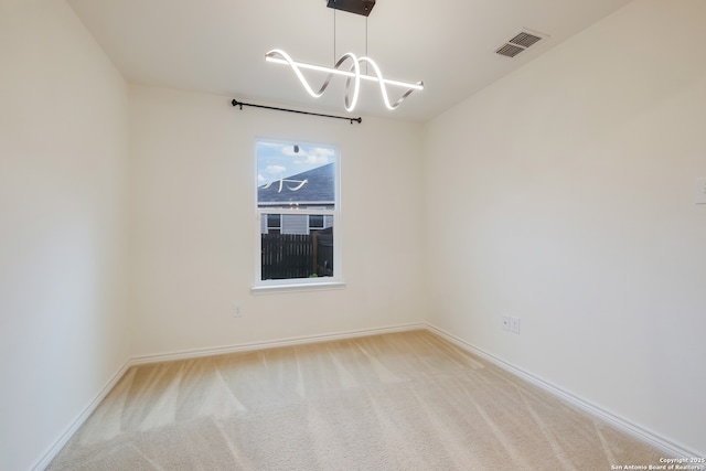8438 Cordova Pt, San Antonio, TX 78252 - spare room with a chandelier and carpet floors