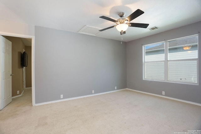 5124 Knollwood, Schertz, TX 78108 - unfurnished room featuring a ceiling fan, light colored carpet, and attic access