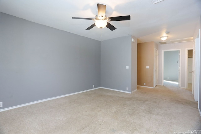 5124 Knollwood, Schertz, TX 78108 - spare room featuring attic access, a ceiling fan, and light colored carpet