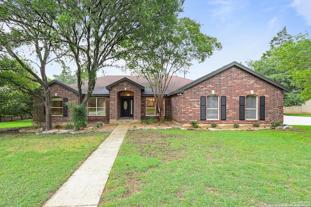 29732 Cojak Cir, Boerne, TX 78015 - view of front of home featuring brick siding and a front lawn