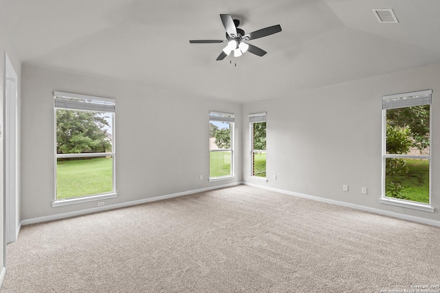 29732 Cojak Cir, Boerne, TX 78015 - empty room featuring vaulted ceiling, healthy amount of natural light, a ceiling fan, and carpet floors
