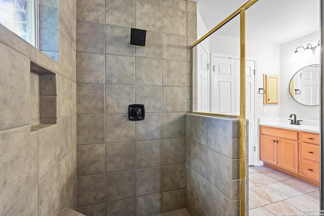 29732 Cojak Cir, Boerne, TX 78015 - bathroom with a tile shower, vanity, and tile patterned flooring