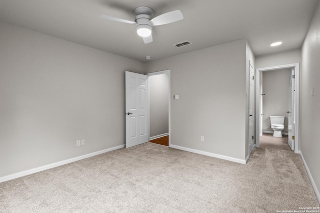 29732 Cojak Cir, Boerne, TX 78015 - unfurnished bedroom featuring carpet, ensuite bathroom, and a ceiling fan
