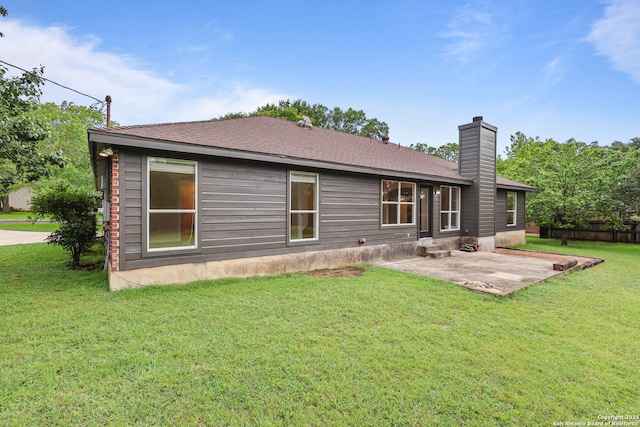 29732 Cojak Cir, Boerne, TX 78015 - back of property with a patio, a chimney, and roof with shingles
