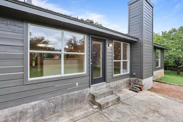 29732 Cojak Cir, Boerne, TX 78015 - doorway to property with a chimney and a patio