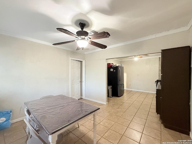 2434 Delgado, San Antonio, TX 78228 - dining room with ceiling fan, crown molding, and light tile patterned floors