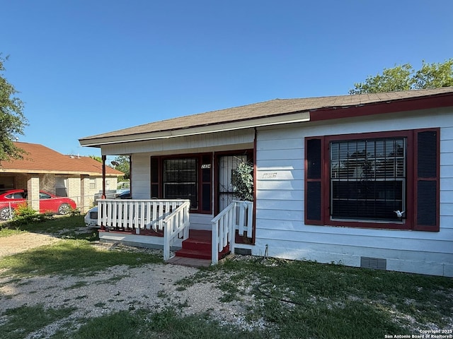2434 Delgado, San Antonio, TX 78228 - property entrance featuring a porch and crawl space
