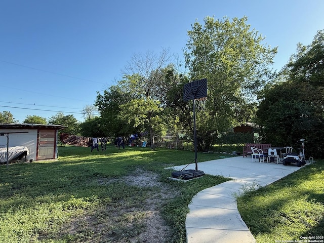 2434 Delgado, San Antonio, TX 78228 - view of green lawn with a patio