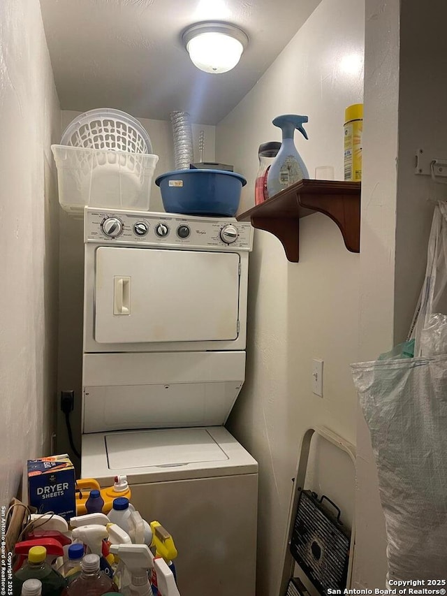 203 Galway, San Antonio, TX 78223 - laundry area featuring stacked washer / drying machine