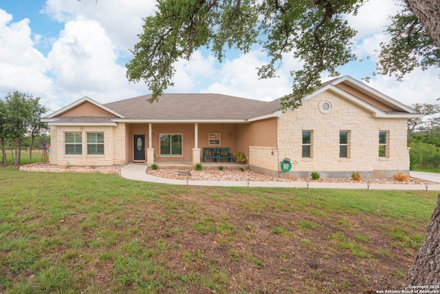 331 John Price, Blanco, TX 78606 - ranch-style home featuring stone siding, a front yard, a porch, a shingled roof, and stucco siding