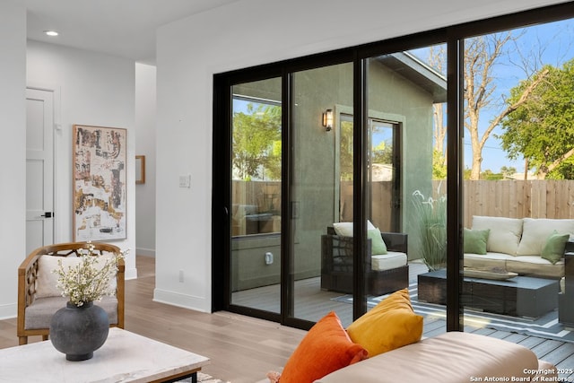 238 Cassiano St, San Antonio, TX 78204 - doorway to outside with light wood-style flooring, plenty of natural light, and recessed lighting