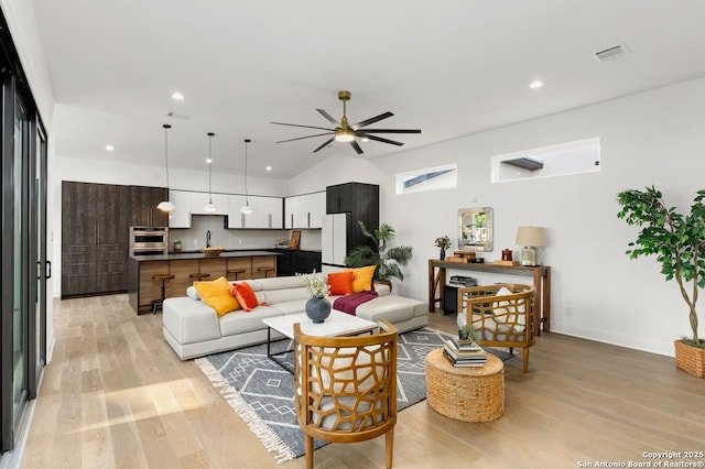 238 Cassiano St, San Antonio, TX 78204 - living area with a ceiling fan, light wood-style flooring, and recessed lighting