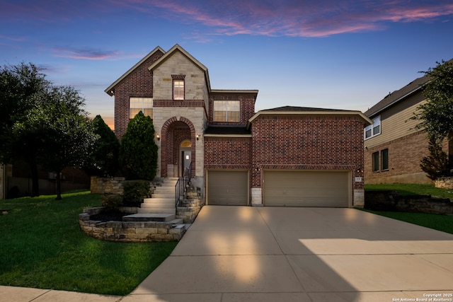 3131 Howling Wolf, San Antonio, TX 78261 - view of front facade featuring brick siding, a garage, driveway, a front lawn, and stone siding
