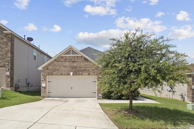 14606 Jocasta, San Antonio, TX 78245 - view of front of house with brick siding, an attached garage, concrete driveway, and a front lawn