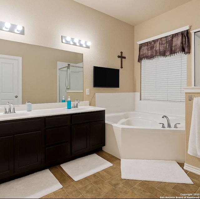 8910 Olmstead Park, Converse, TX 78109 - full bathroom with a garden tub, double vanity, tile patterned floors, and a shower