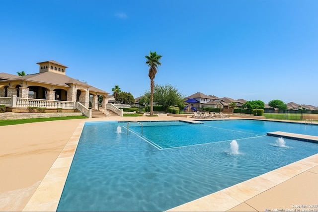 8910 Olmstead Park, Converse, TX 78109 - community pool featuring a patio area
