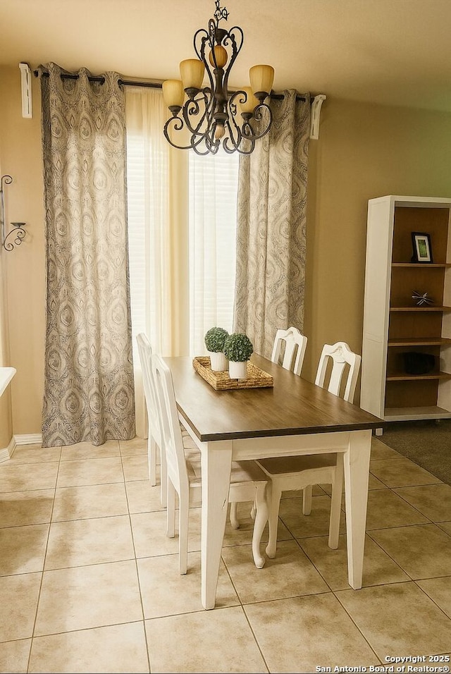 8910 Olmstead Park, Converse, TX 78109 - dining room with a chandelier and tile patterned flooring