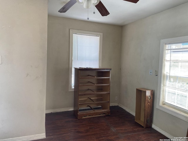 1538 Brighton, San Antonio, TX 78211 - empty room featuring a ceiling fan and dark wood-style floors