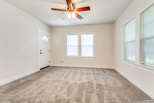 1013 Sacramento, San Antonio, TX 78201 - unfurnished room featuring plenty of natural light, light carpet, and a ceiling fan