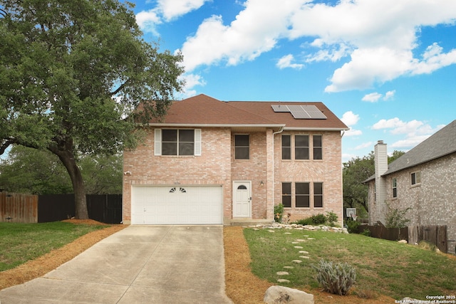 18706 Redriver, San Antonio, TX 78259 - traditional-style home featuring a garage, driveway, solar panels, and brick siding