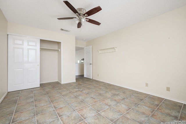 18706 Redriver, San Antonio, TX 78259 - unfurnished bedroom featuring a closet, ceiling fan, and a textured ceiling