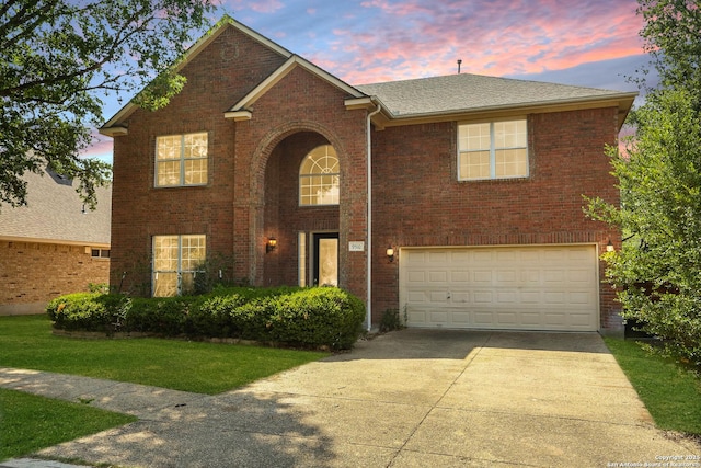 9510 Loyal, San Antonio, TX 78251 - traditional-style home featuring driveway, a garage, brick siding, and a yard