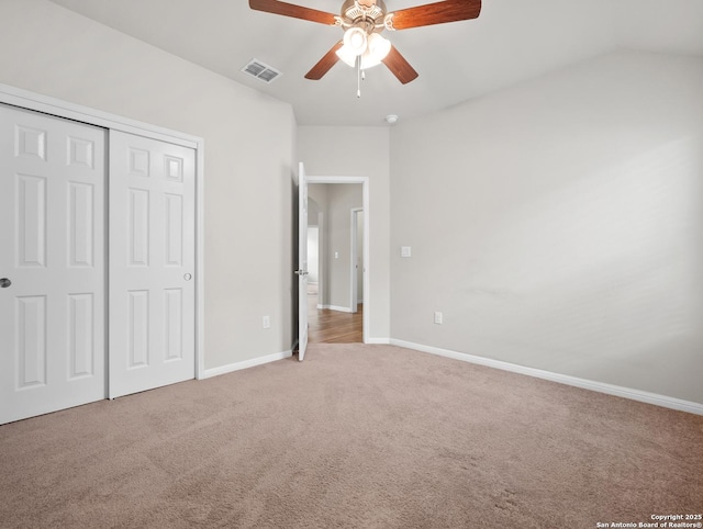 10333 Laurie Ln, Austin, TX 78747 - unfurnished bedroom with light carpet, a closet, and ceiling fan